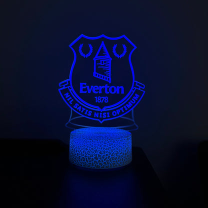Blue LED lamp with Everton logo on a dark background